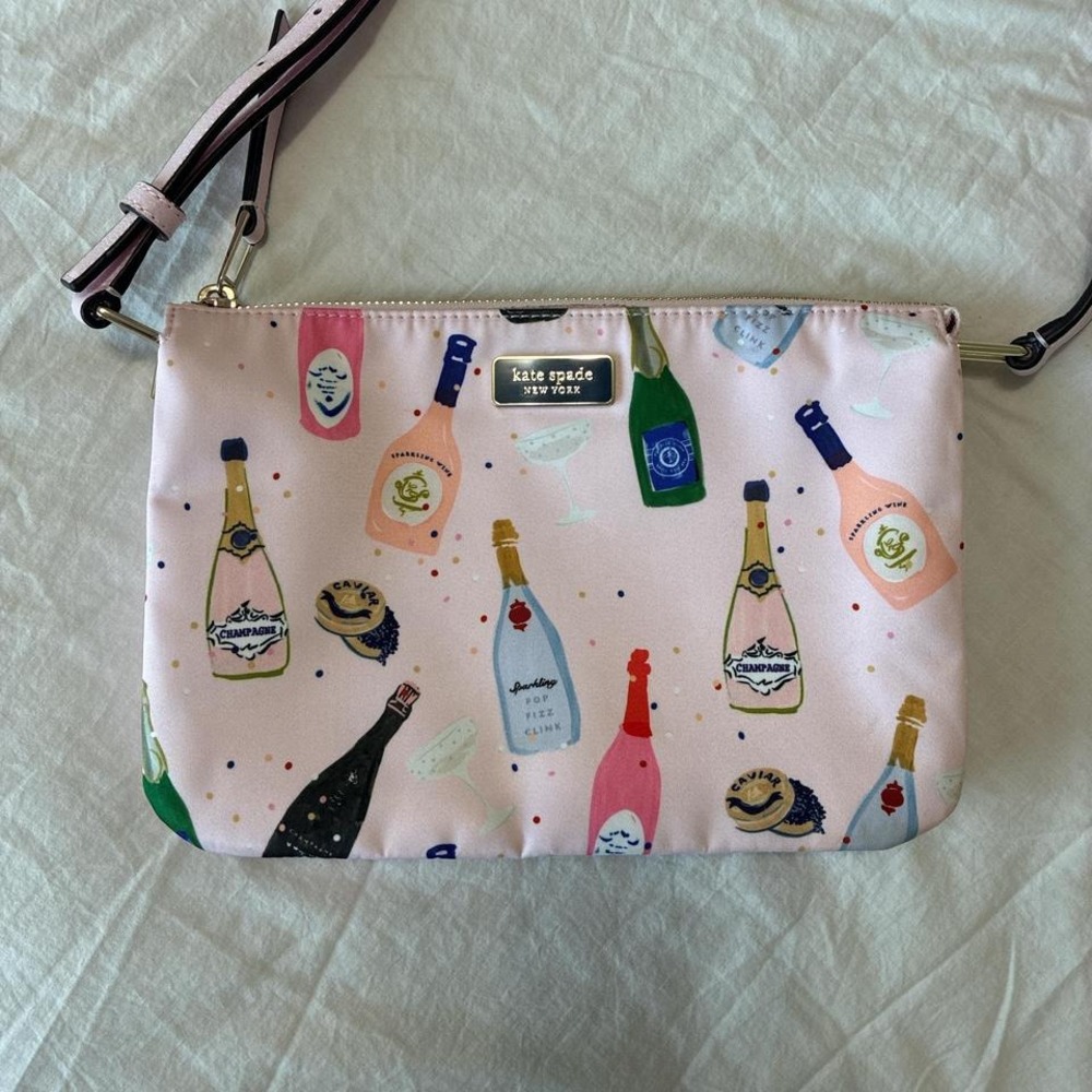 Pink Kate Spade New York champagne bottle bag